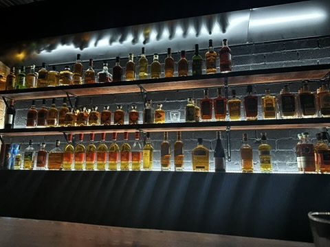 Backlit whisky collection at The Blind Pig